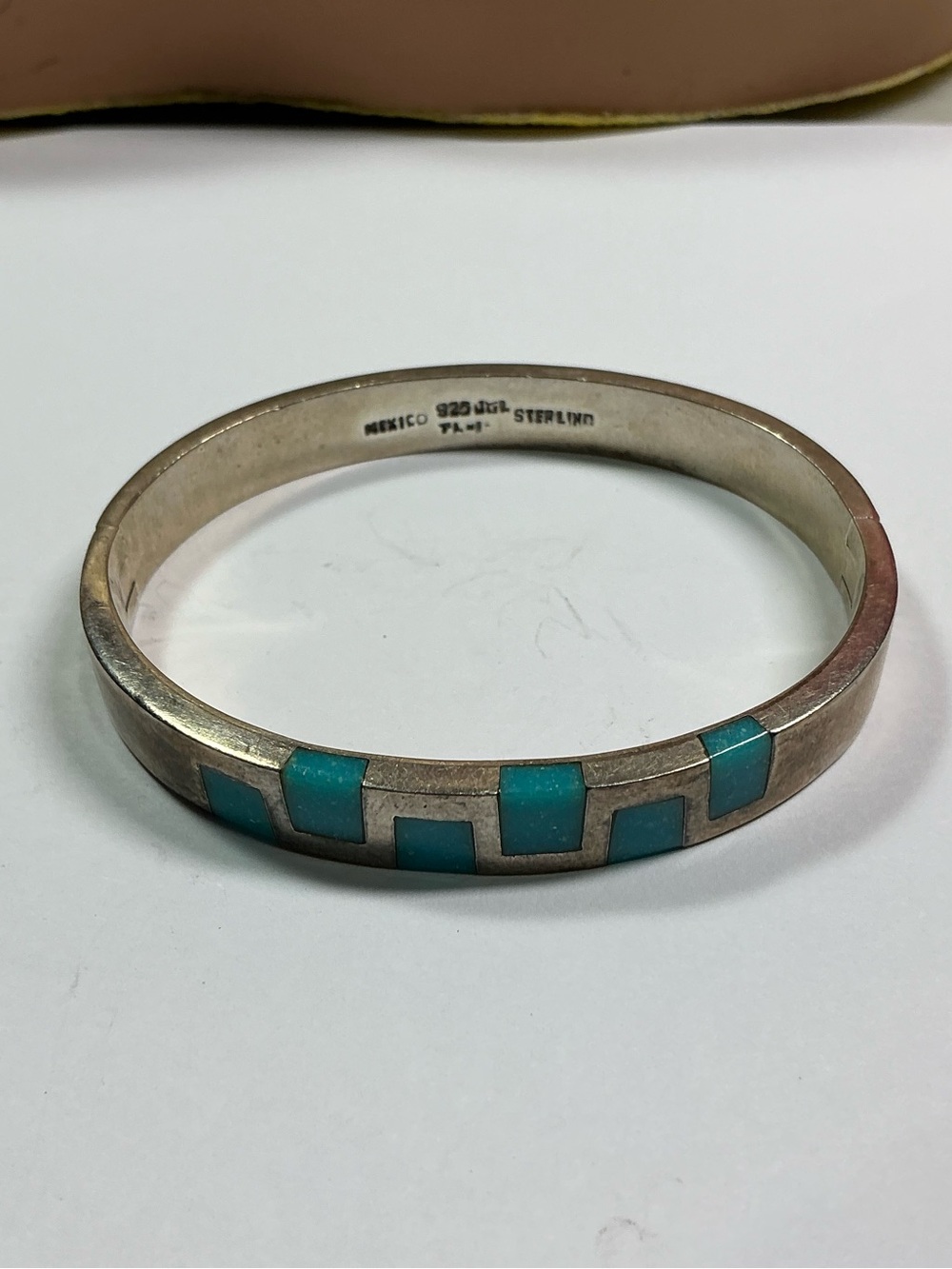 Taxco Sterling Silver Hinged Bracelet with Inlaid Turquoise.